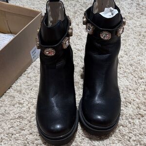 Elegant Black Ankle Boots with Gold Accents